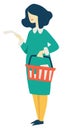 Woman with supermarket basket and shopping list food shopping Royalty Free Stock Photo