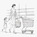Woman in supermarket with a kids and shopping cart full of groceries.