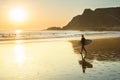 woman surfboard walking beach Portugal Royalty Free Stock Photo