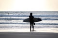 Woman surfer in black wetsuit Royalty Free Stock Photo