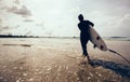 Woman surfer with surfboard Royalty Free Stock Photo