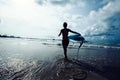 Woman surfer with surfboard Royalty Free Stock Photo