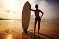 Woman surfer with white surfboard Royalty Free Stock Photo