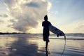 Woman surfer with white surfboard Royalty Free Stock Photo