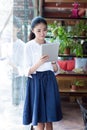 Woman surfing the net in coffee shop Royalty Free Stock Photo