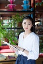 Woman surfing the net in coffee shop Royalty Free Stock Photo