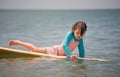 Woman surfing at the sea, summer vacation