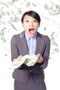 Woman surprised face with falling money Royalty Free Stock Photo