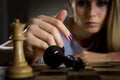 Woman surrendering her king in chess Royalty Free Stock Photo