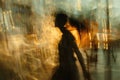 A woman, surrounded by a blur of city lights, gracefully walks down a bustling street in this artistic portrayal of