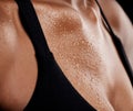 Woman, sweat and chest from intense workout, fitness or physical exercise in fat burn or weight loss. Sweaty female