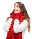 Woman in sweater, scarf and mittens