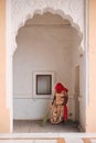Woman sweeping cleaning the ground in Mehrangarh fort. Jodhpur, Rajasthan, India Royalty Free Stock Photo