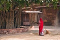 Woman sweeping cleaning the ground in Mehrangarh fort. Jodhpur, Rajasthan, India Royalty Free Stock Photo