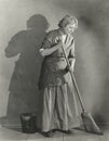 Woman sweeping floor Royalty Free Stock Photo