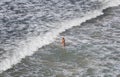 A woman swim in Cala Major beach in Mallorca