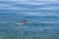 Woman swim in the sea water. Kemer, Turkey