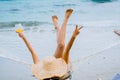 Woman in swimimg suit relax laying on hammock on beach