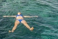 Woman swiming in the sea. Beautiful girl swiming at tropical island Royalty Free Stock Photo