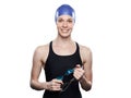 Woman swimmer isolated over white background. Sportswoman smiling. Sportswoman wearing swimming cap holds goggles in hands Royalty Free Stock Photo