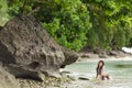 Woman swimming on a beautiful lush