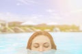 Woman swimming in the pool. Royalty Free Stock Photo