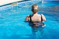 Woman in the swimming pool Royalty Free Stock Photo