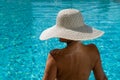 Woman at the swimming pool on the island of Santorini in Greece Royalty Free Stock Photo