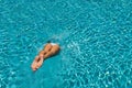 Woman at the swimming pool on the island of Santorini in Greece Royalty Free Stock Photo