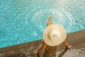 Woman at the swimming pool on the island of Santorini in Greece Royalty Free Stock Photo