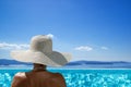 Woman at the swimming pool on the island of Santorini in Greece Royalty Free Stock Photo