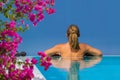 Woman at the swimming pool on the island of Santorini in Greece Royalty Free Stock Photo