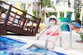 Woman at the swimming pool Royalty Free Stock Photo