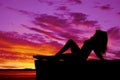 Woman swimwear sit silhoutte head back Royalty Free Stock Photo