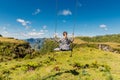 Hiker woman on a swing in Canyon park in Santa Catarina, Brazil