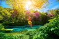 Woman swinging on the river Royalty Free Stock Photo