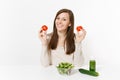 Woman at table with green detox smoothies, fresh salad in glass bowl, tomato, cucumber isolated on white background Royalty Free Stock Photo