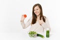 Woman at table with green detox smoothies, fresh salad in glass bowl, tomato, cucumber isolated on white background Royalty Free Stock Photo