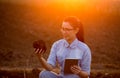 Woman with tablet and earth clod Royalty Free Stock Photo