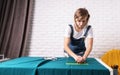 Woman tailor working with textile in her studio Royalty Free Stock Photo