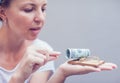 Woman take dollar from mous trap business concept Royalty Free Stock Photo