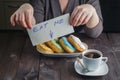 Woman take donuts and hold message eat me Royalty Free Stock Photo