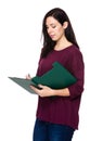 Woman take note on clipboard Royalty Free Stock Photo