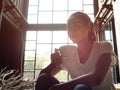 Woman takes a coffee break. Royalty Free Stock Photo