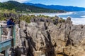 Woman takes pictures of rocks