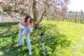 A woman takes a selfie with a baby in her arms Royalty Free Stock Photo