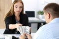 Woman taking batch of hundred dollar bills Royalty Free Stock Photo