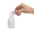 Woman taking chewing gum pieces from jar on white background, closeup