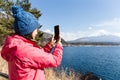 Woman taking image on mountain Fuji Royalty Free Stock Photo