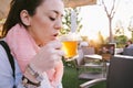 Woman taking an infusion on the outdoor